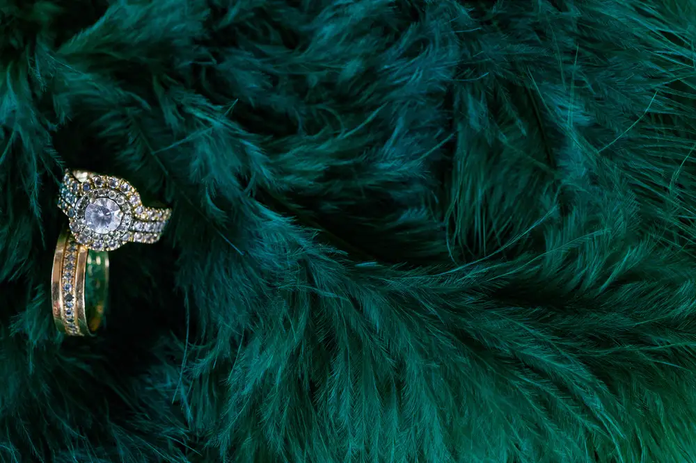Wedding rings in green furry fabric