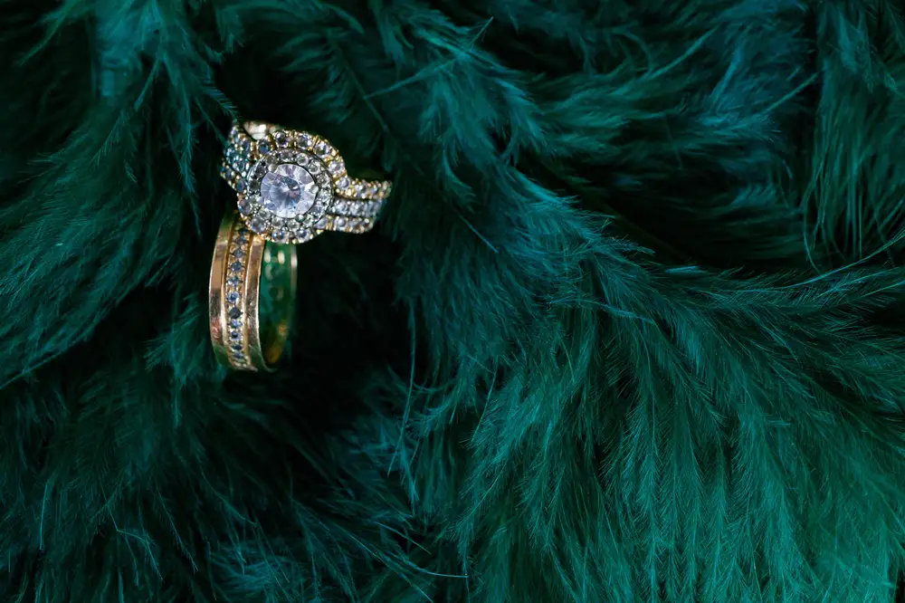Wedding rings in green furry fabric