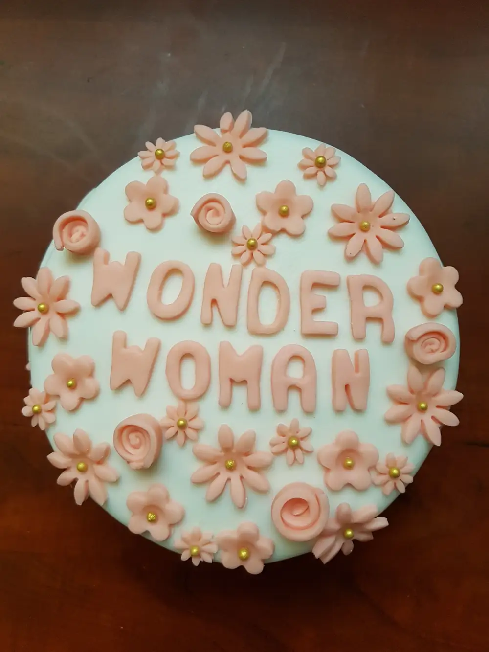 Birthday cake that says wonder woman