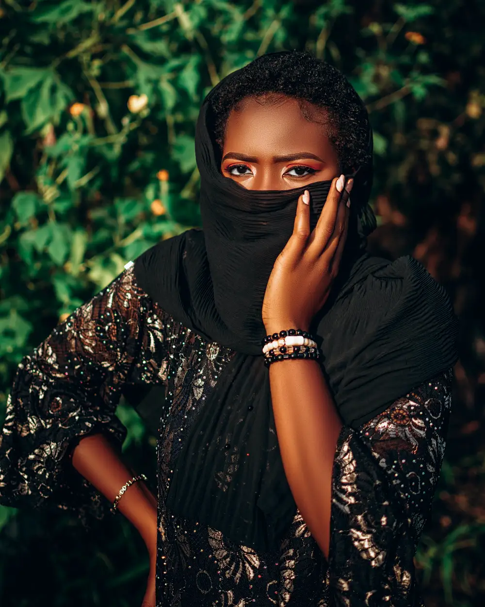 Lady on shiny gown covering face