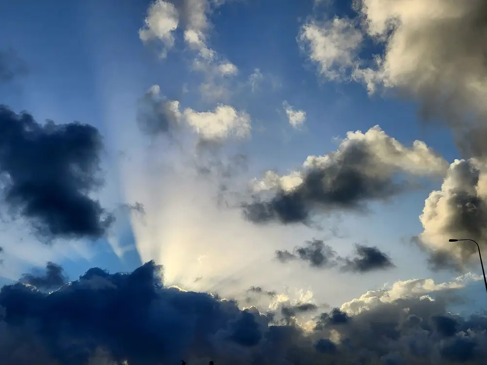 Sun breaking through the clouds in the morning