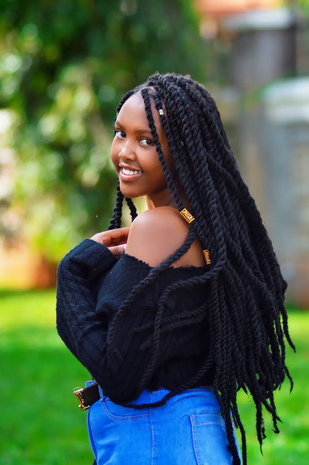 Woman smiling with braids