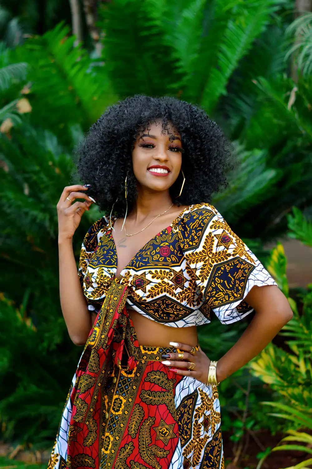 Woman poses in her Ankara gown.