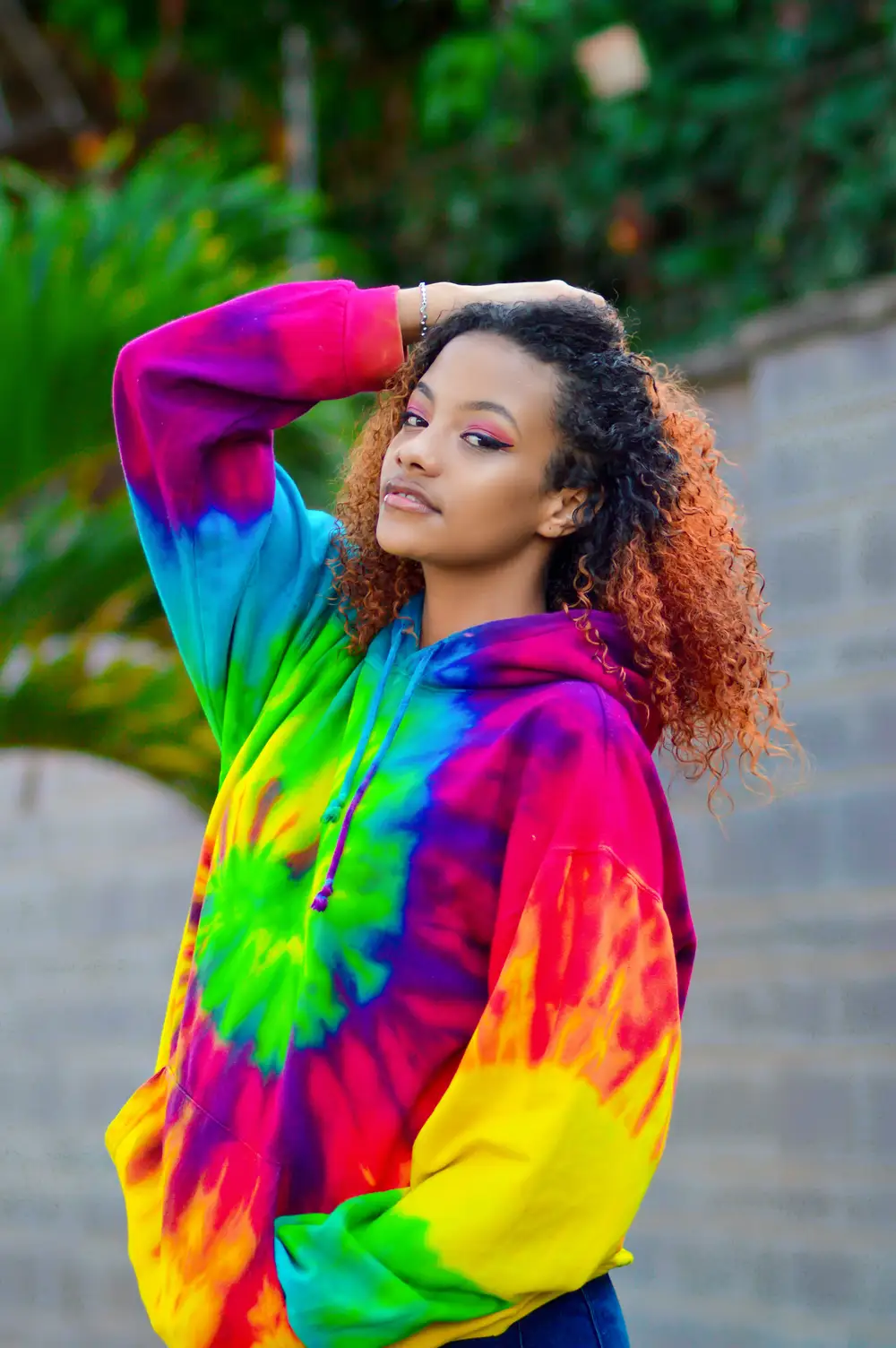 Lady in multicoloured tie and dye hoodie