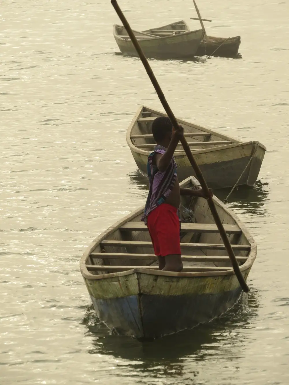 Kid on Canoe