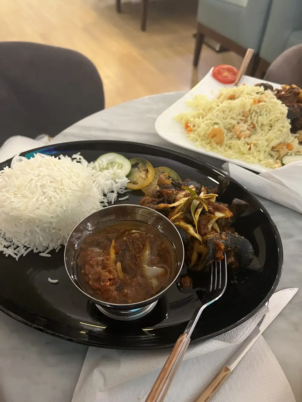 Steamed rice and sauce and peppered snail