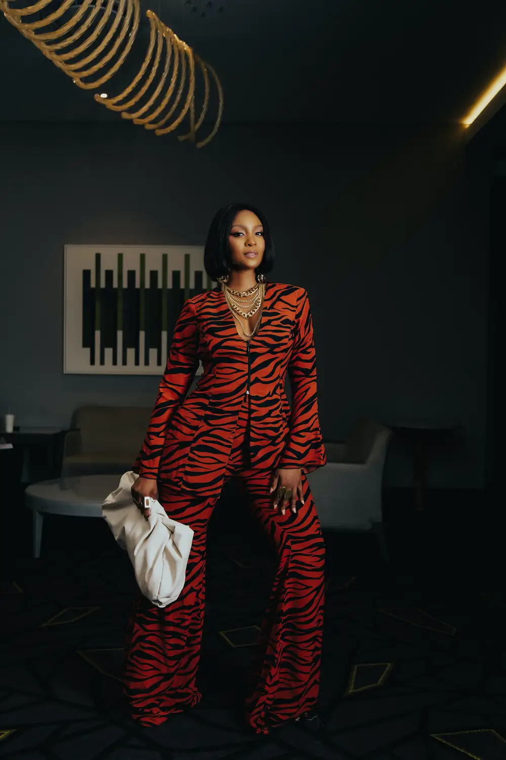 Woman Wearing a Zebra Print Black and Red Suit