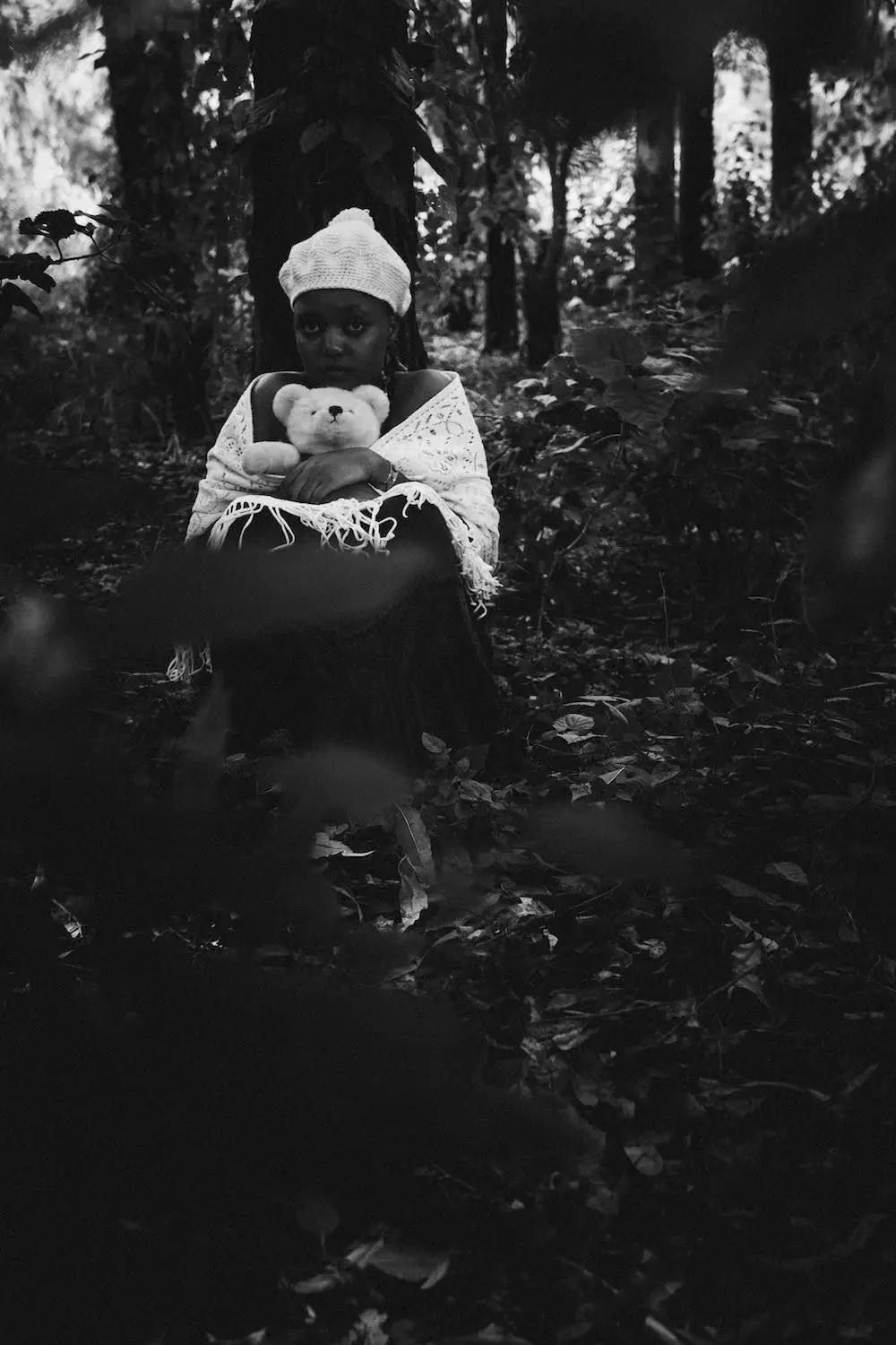 Woman holding teddy bear