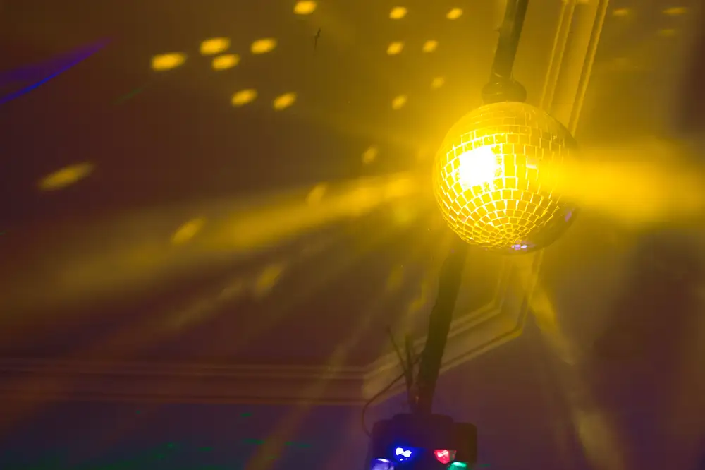 Disco Ball Glowing In A Club