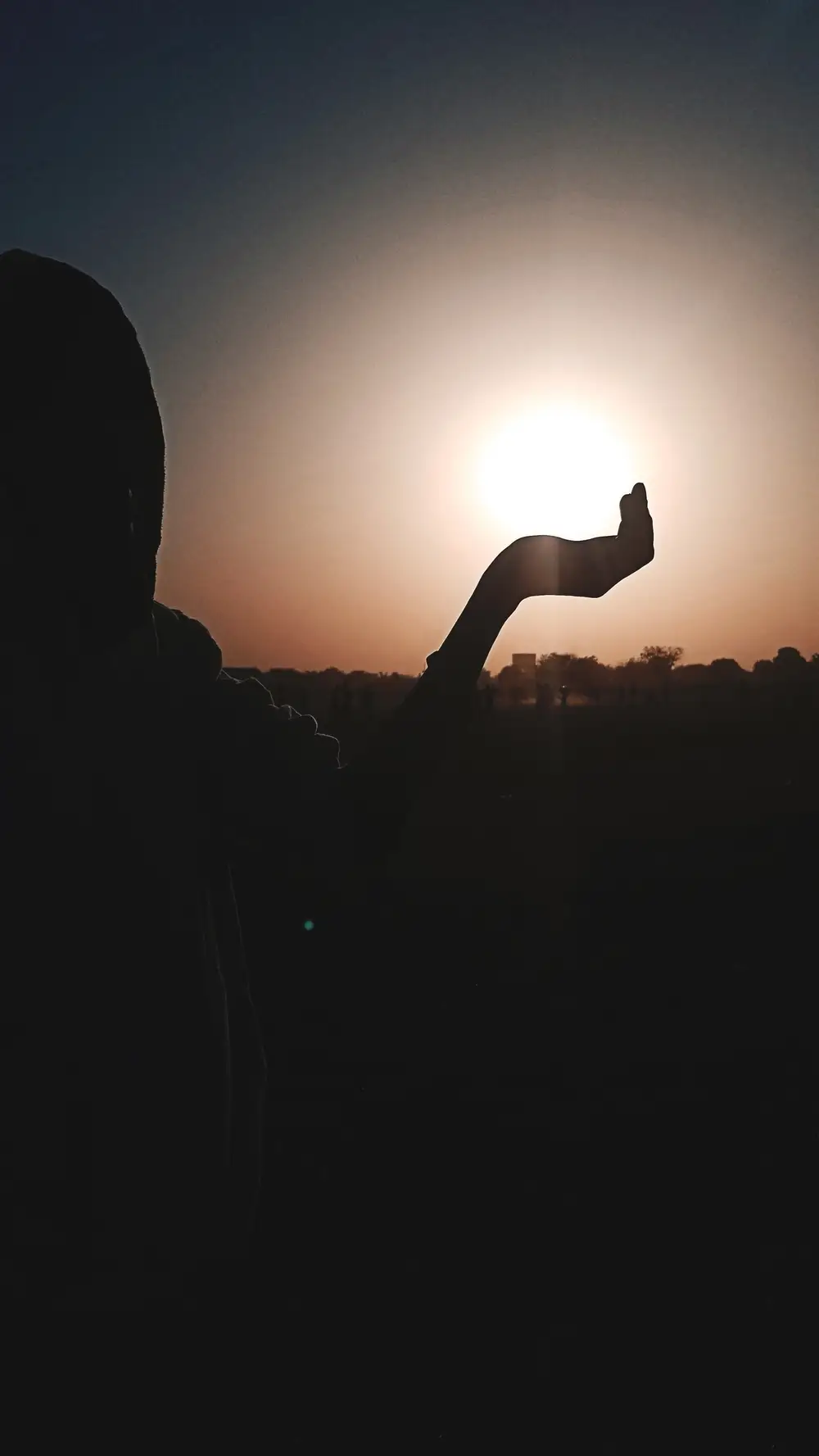 Hand Holding the Sun