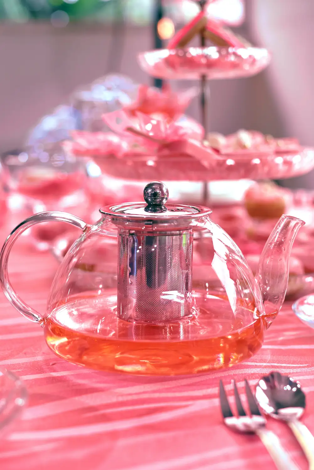 Warm Pink Strawberry Tea In Kettle