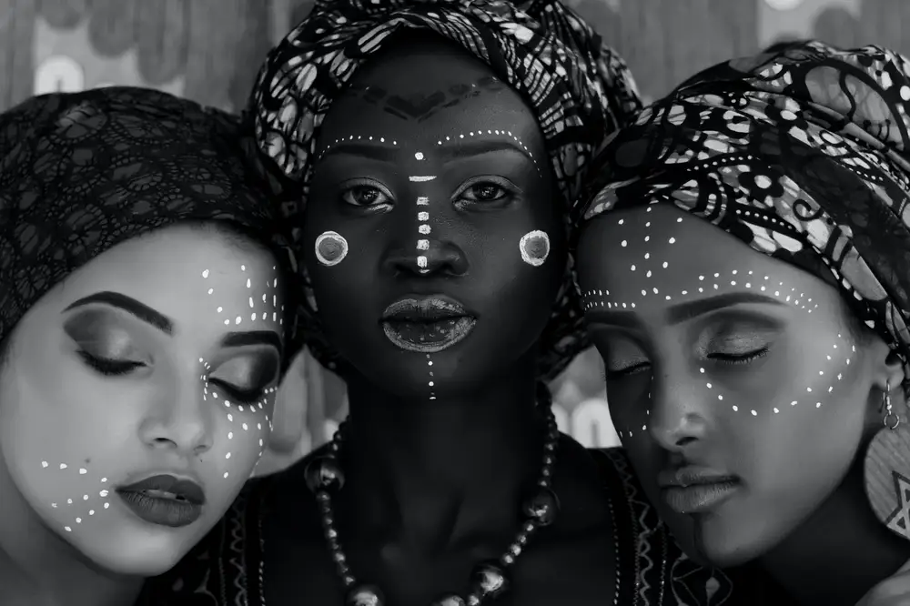 women with African face paintings