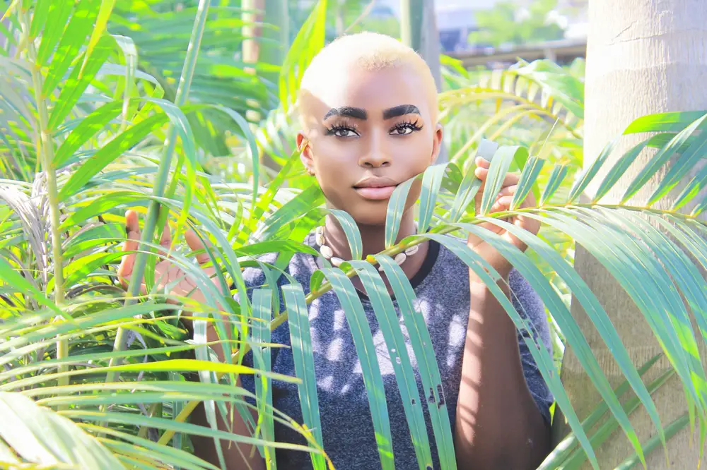 woman with palm fronds