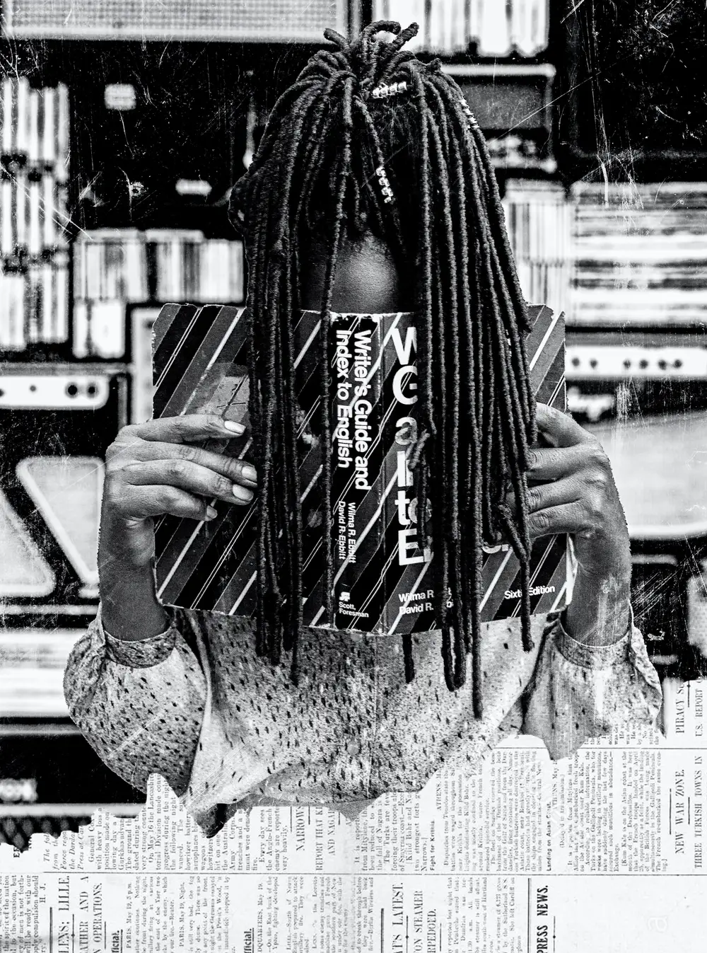 A Lady with braids reading a book