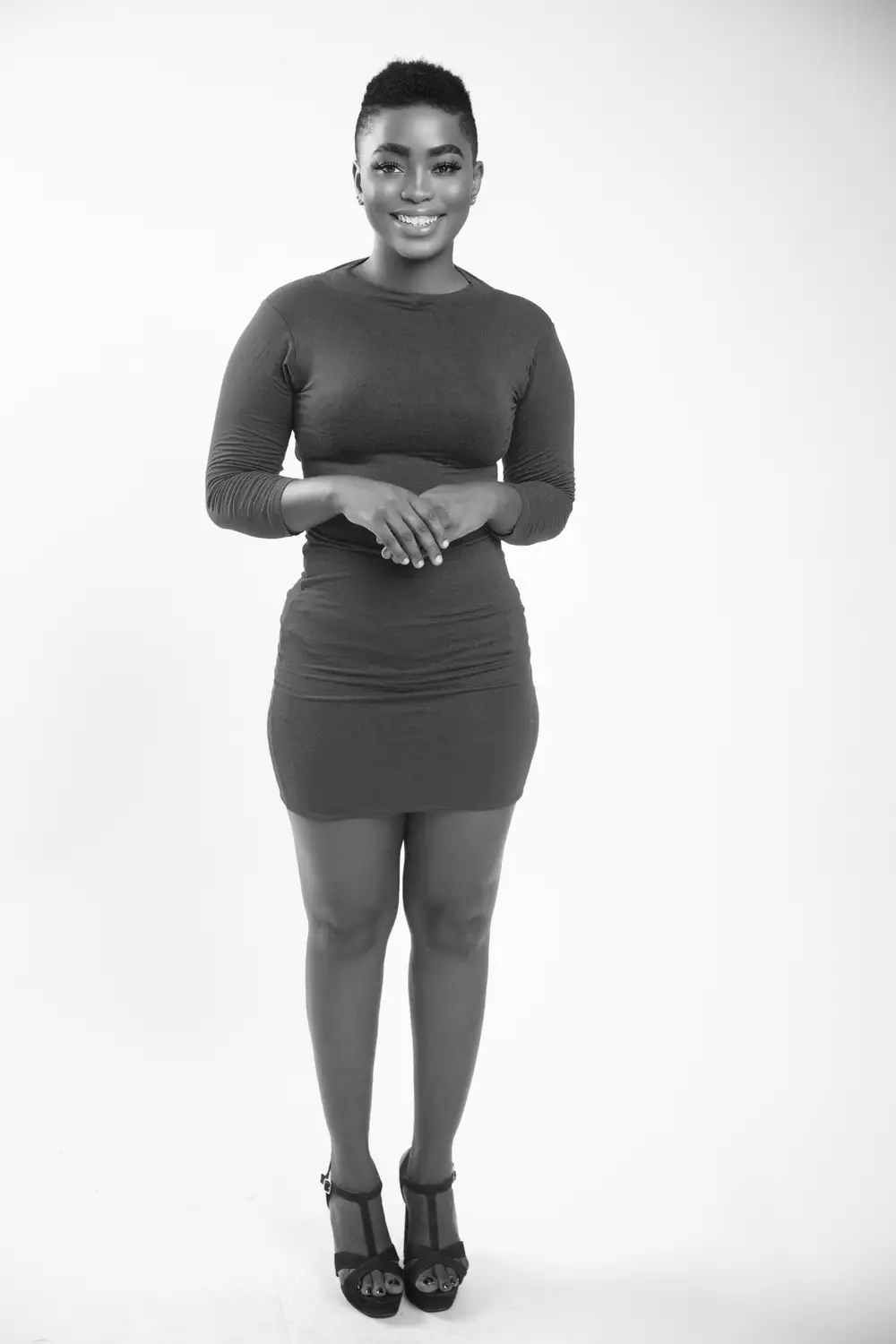 woman in dress with short hair