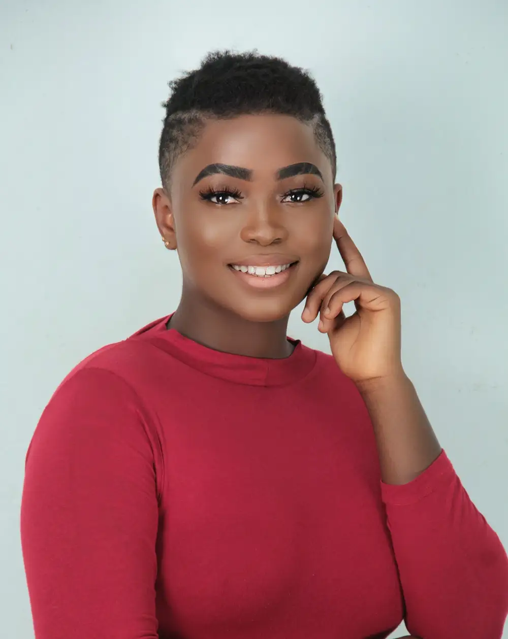 woman with hands to her face