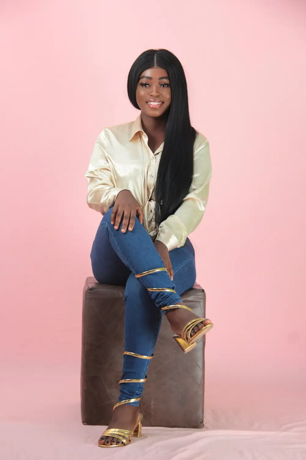 model posing in blue jeans