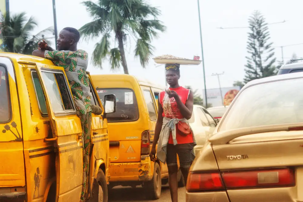 A street hawker in a bus park