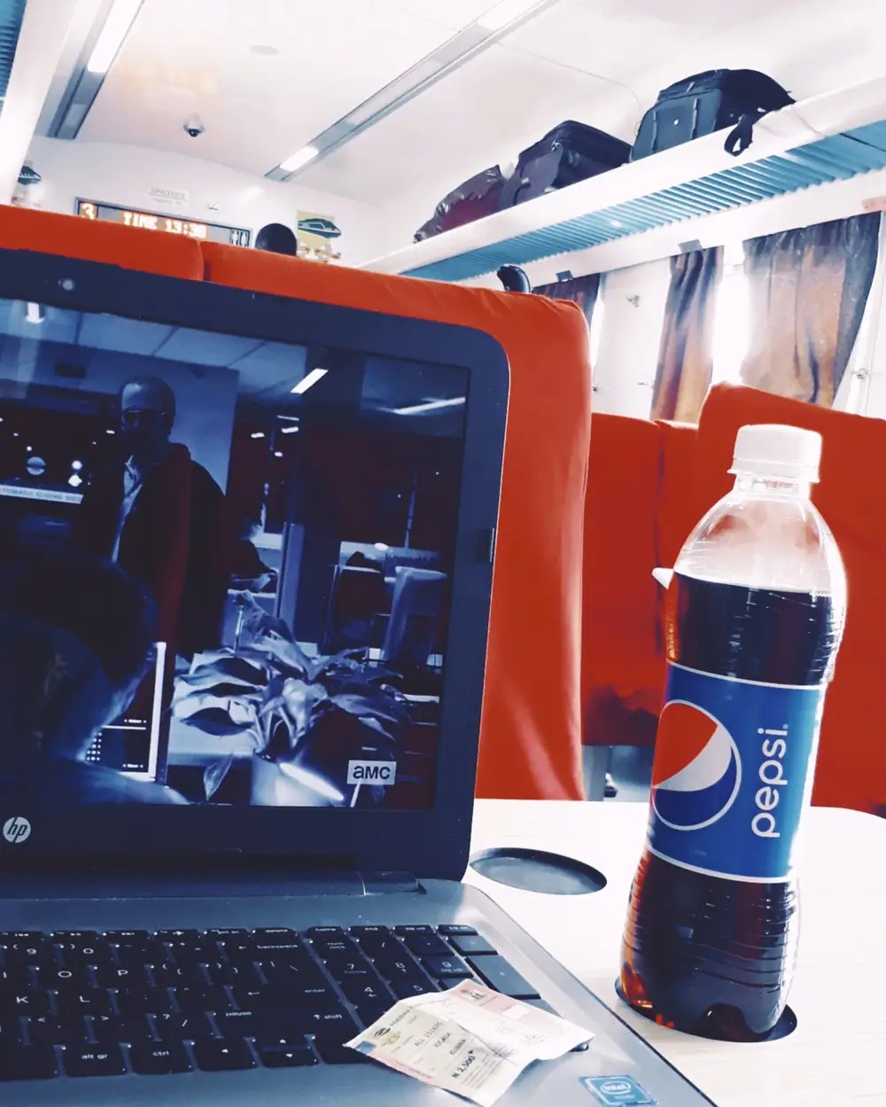 pepsi in front of laptop