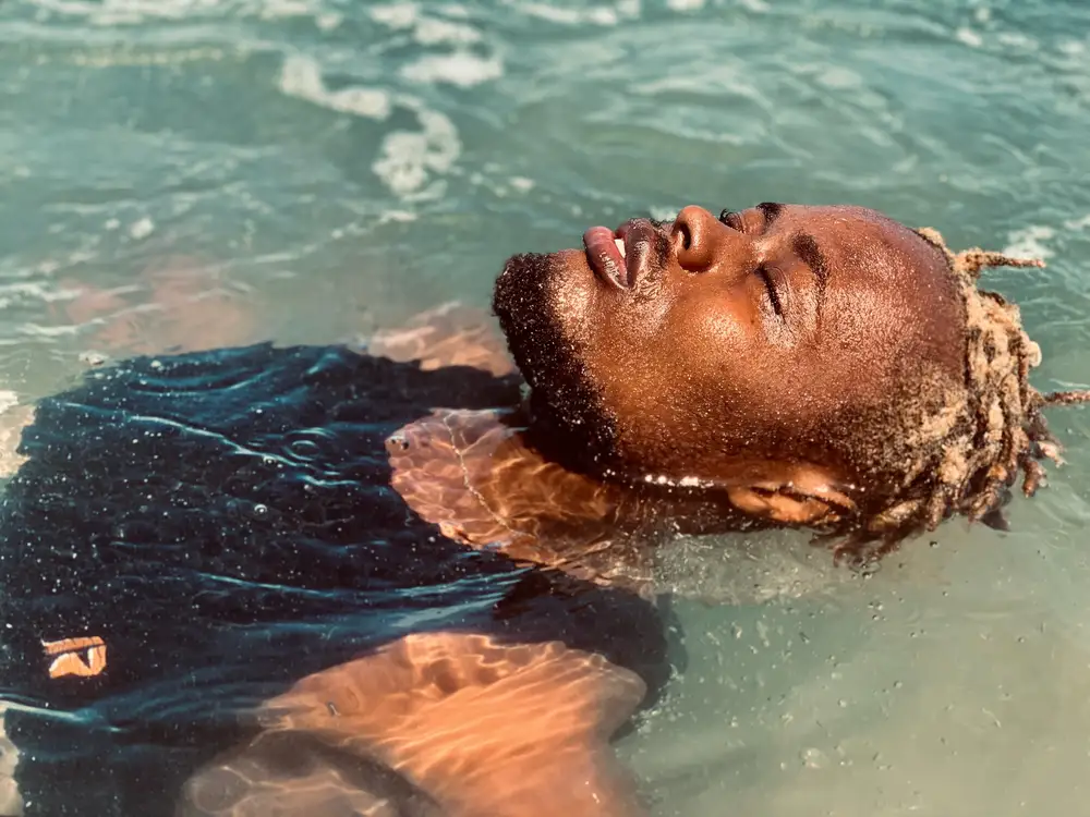 black man swimming
