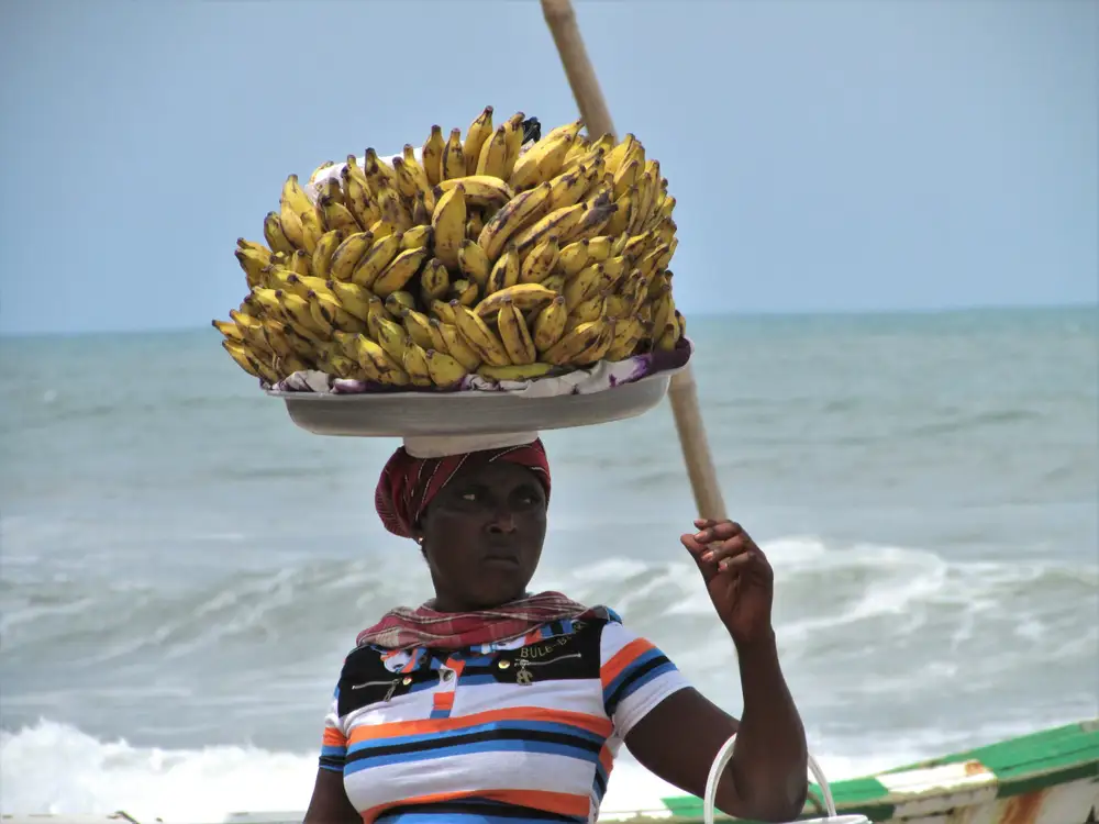 a woman hawking banana