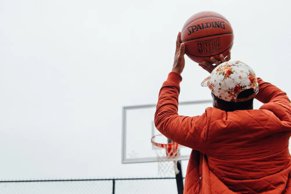 Person Holding Basket Ball