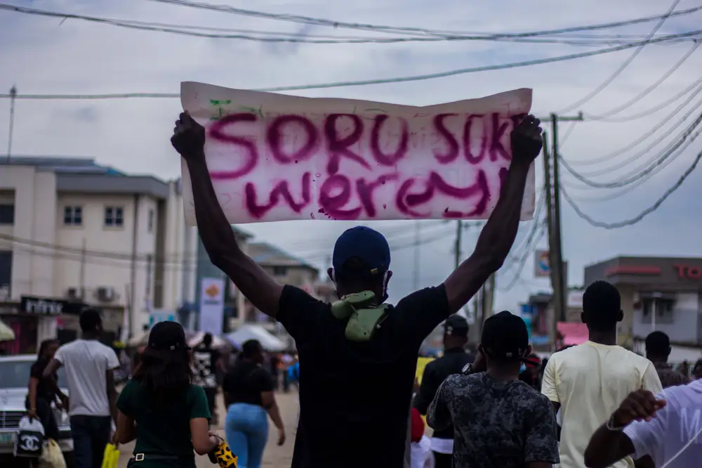 A protester hold a placard during the End SARS protests in Lagos, Nigeria