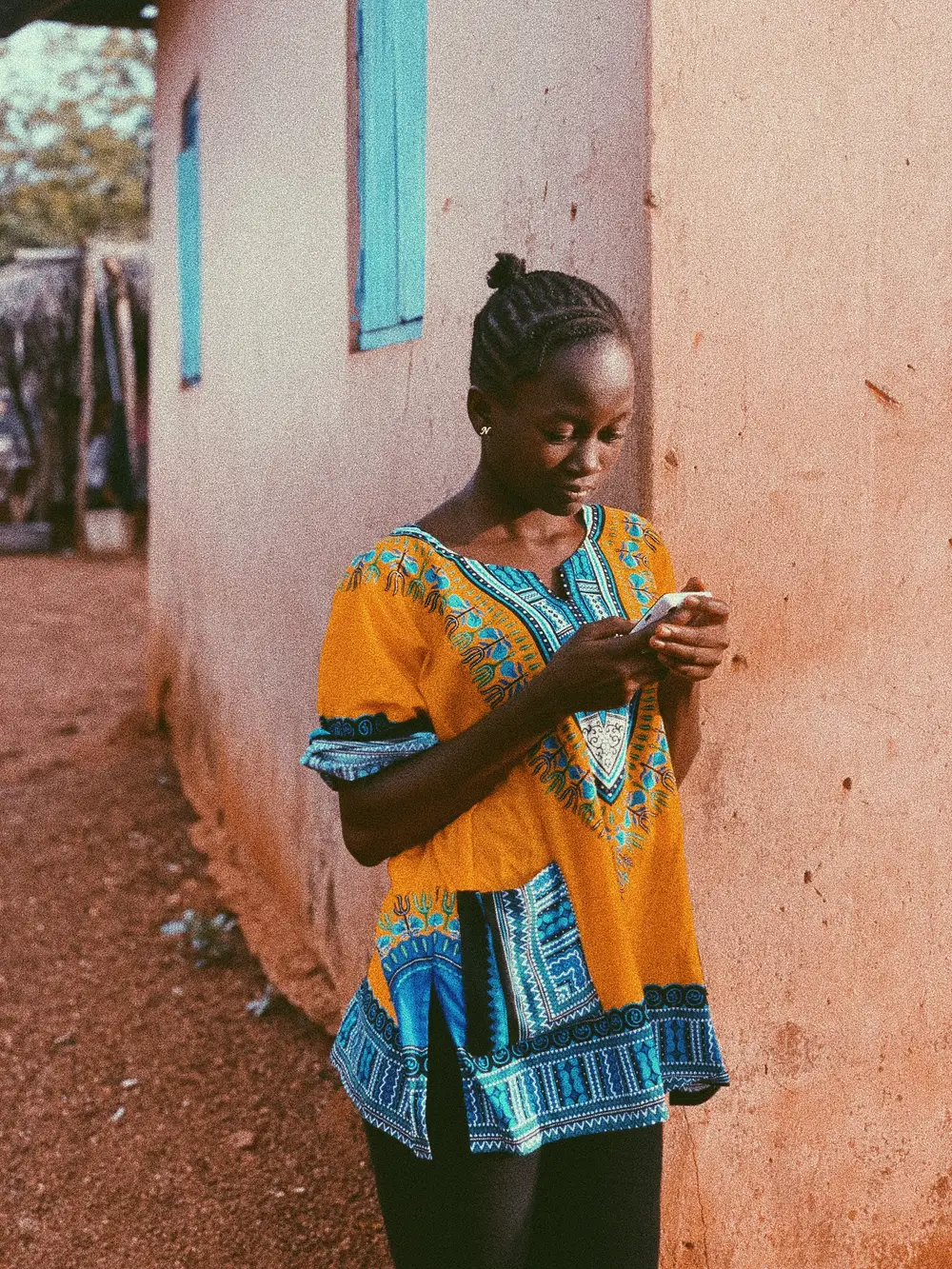 Young girl chatting on her phone