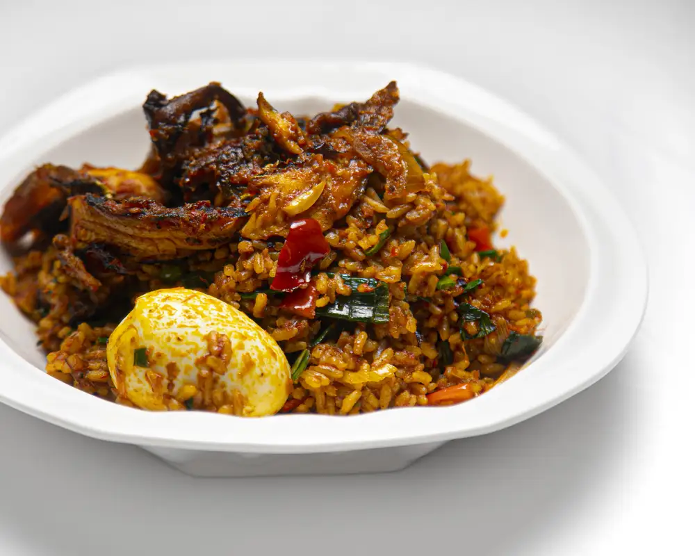 Local Jollof rice dry fish and egg