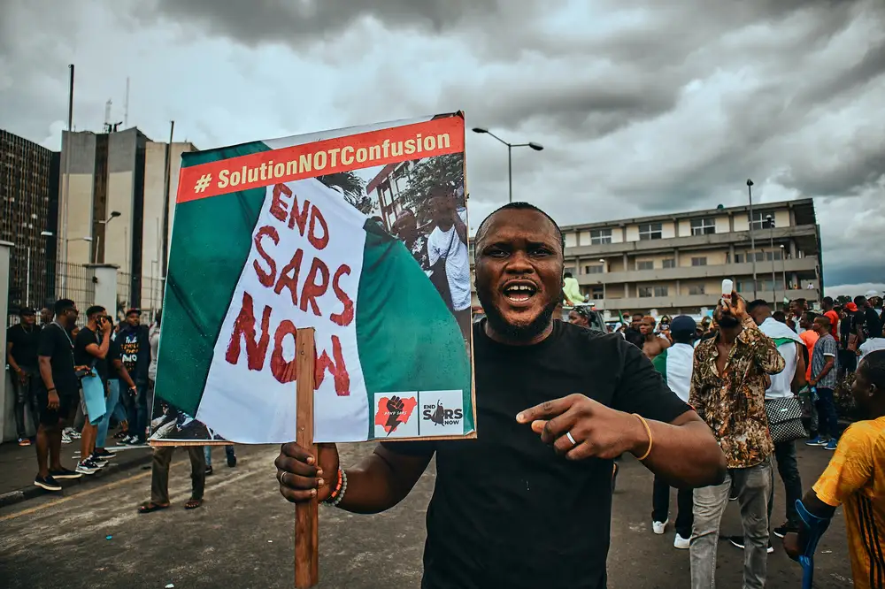 Protesters walking around the city of Port Harcourt with placards and sign for the #Endsars protests in Nigeria.