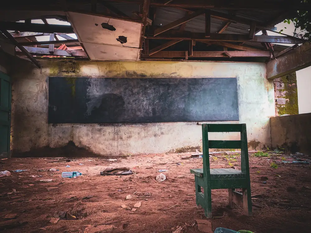 Abandoned classroom in a dilapidated building