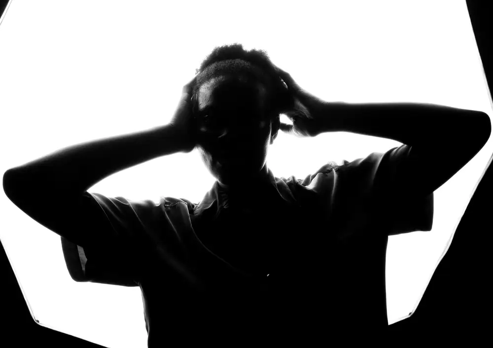 A silhouetted image of a woman