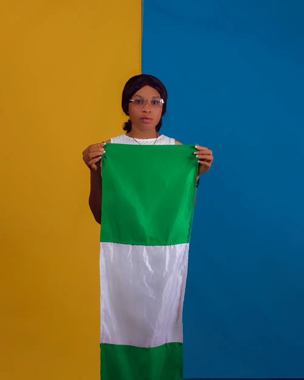 A Nigerian photoshoot with Ukrainian flag background
