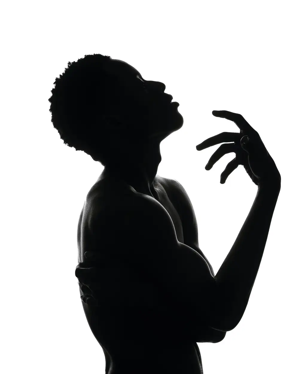 silhouette of a muscular young man