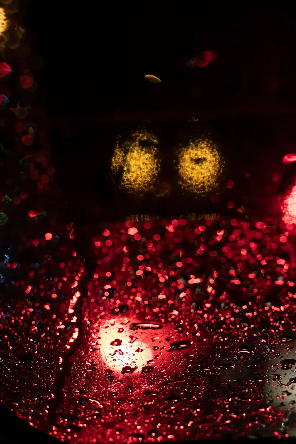 Car Light reflections on raindrops