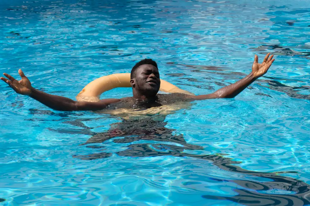 Man having fun in the pool