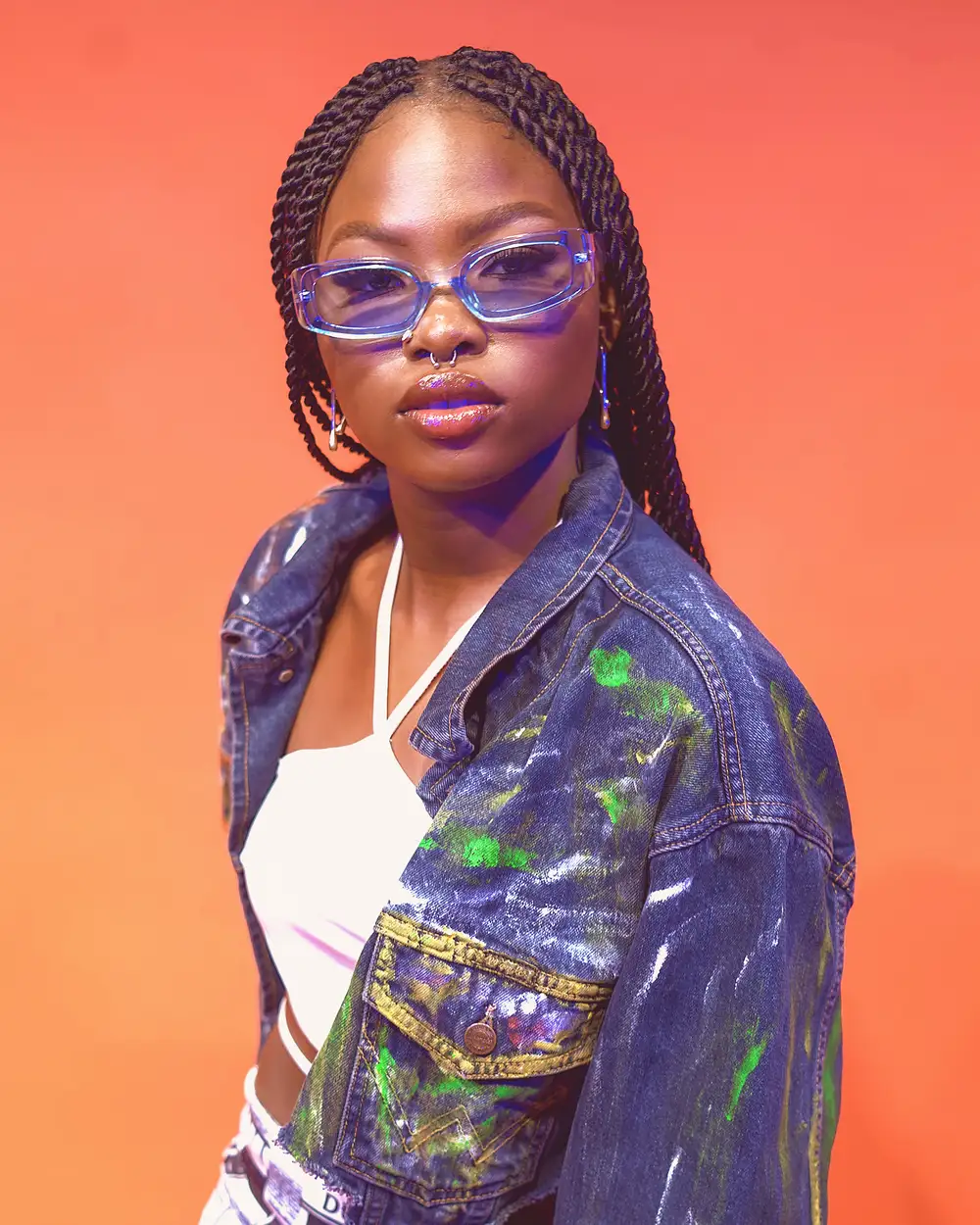 Nigerian Singer Ria Sean in paint splattered denim jacket