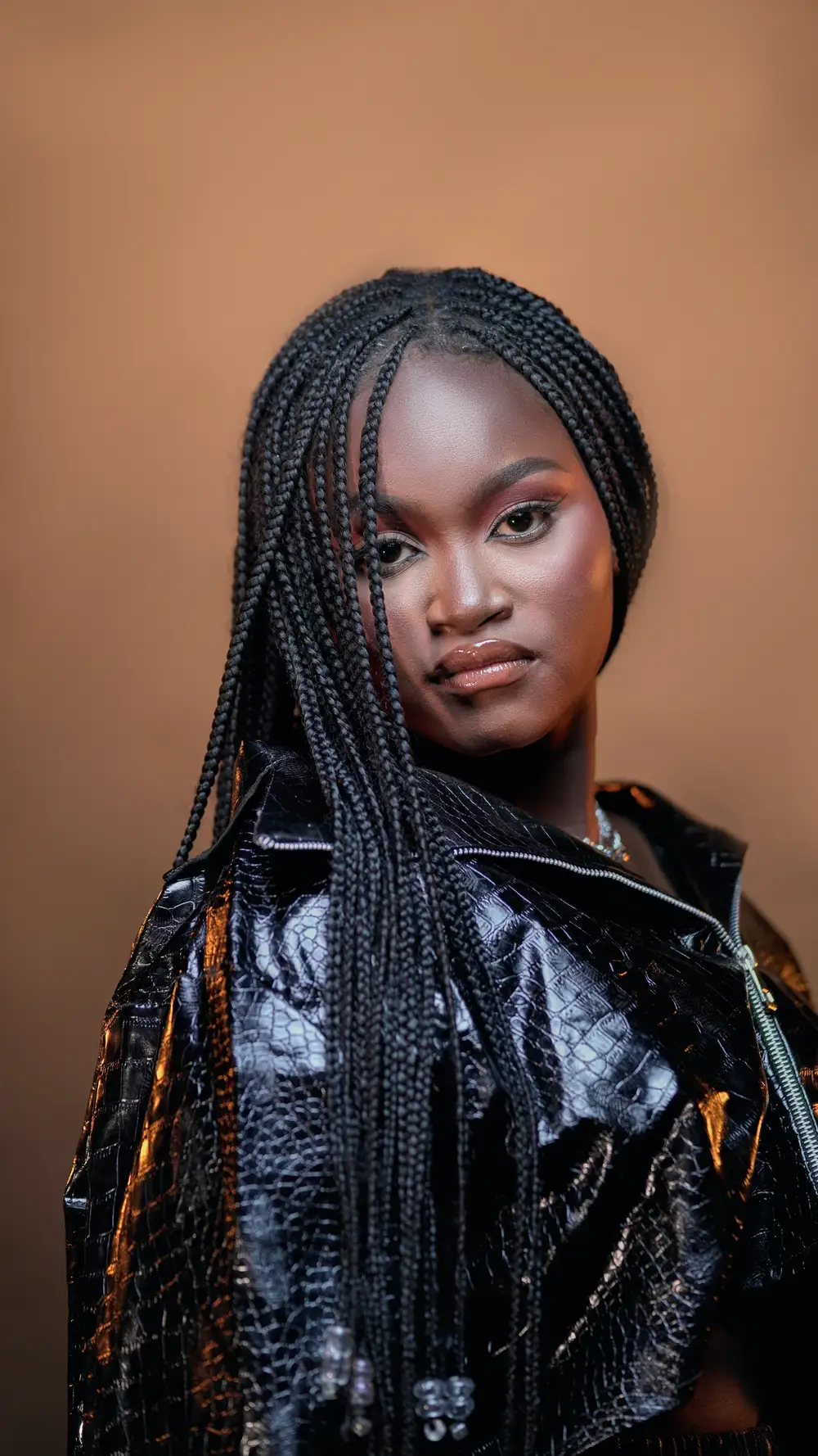 Nigerian Singer Raebell in long braids