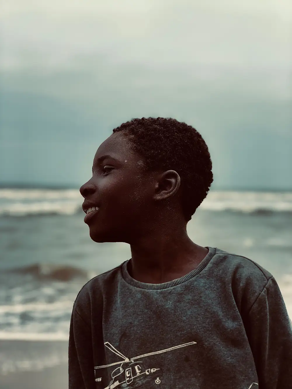 Black child at the sea