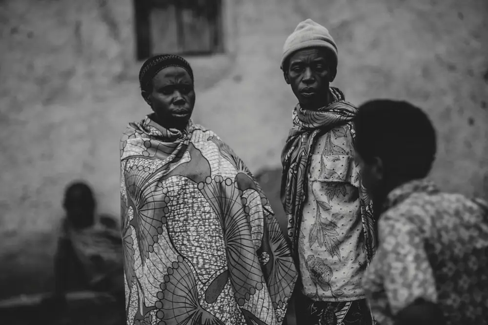 man and woman covering their body