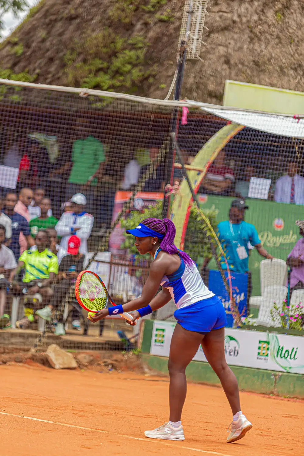 woman playing long tennis