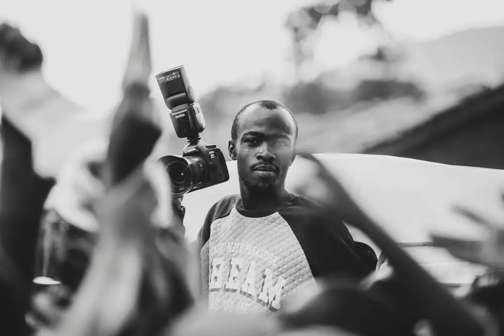 a man holding a camera