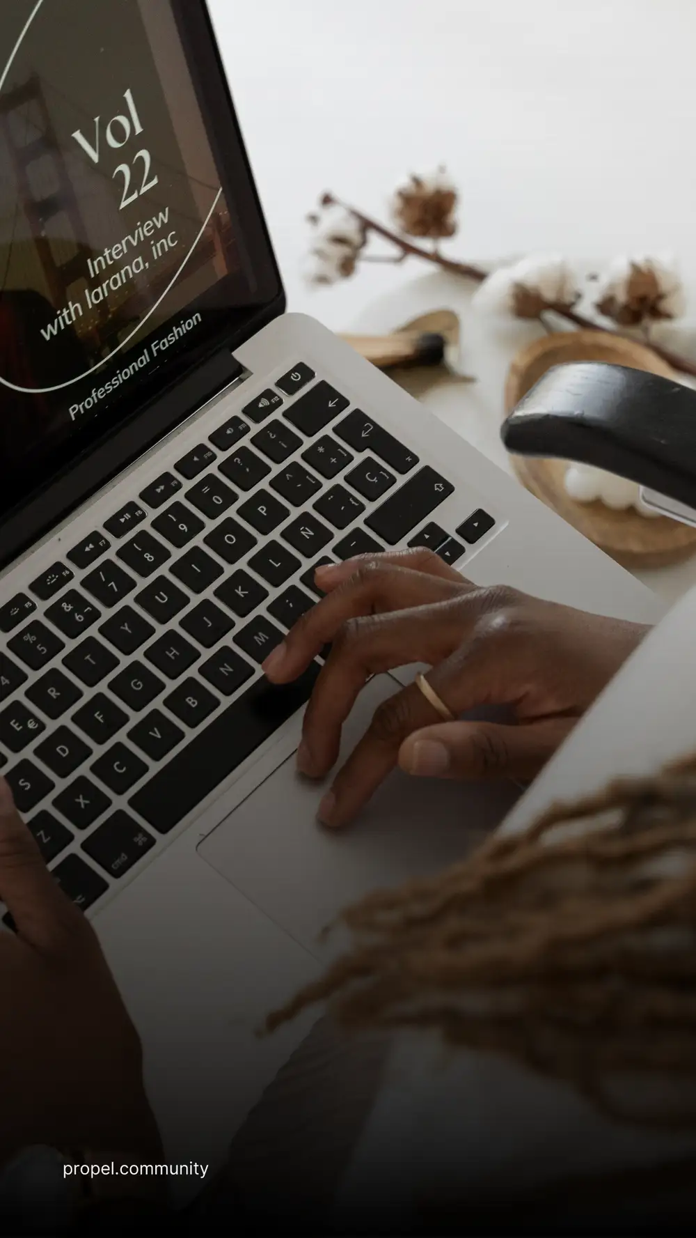 Black hand on laptop
