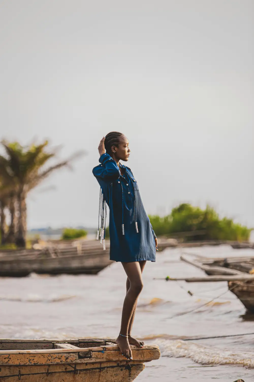 lady posing by the water