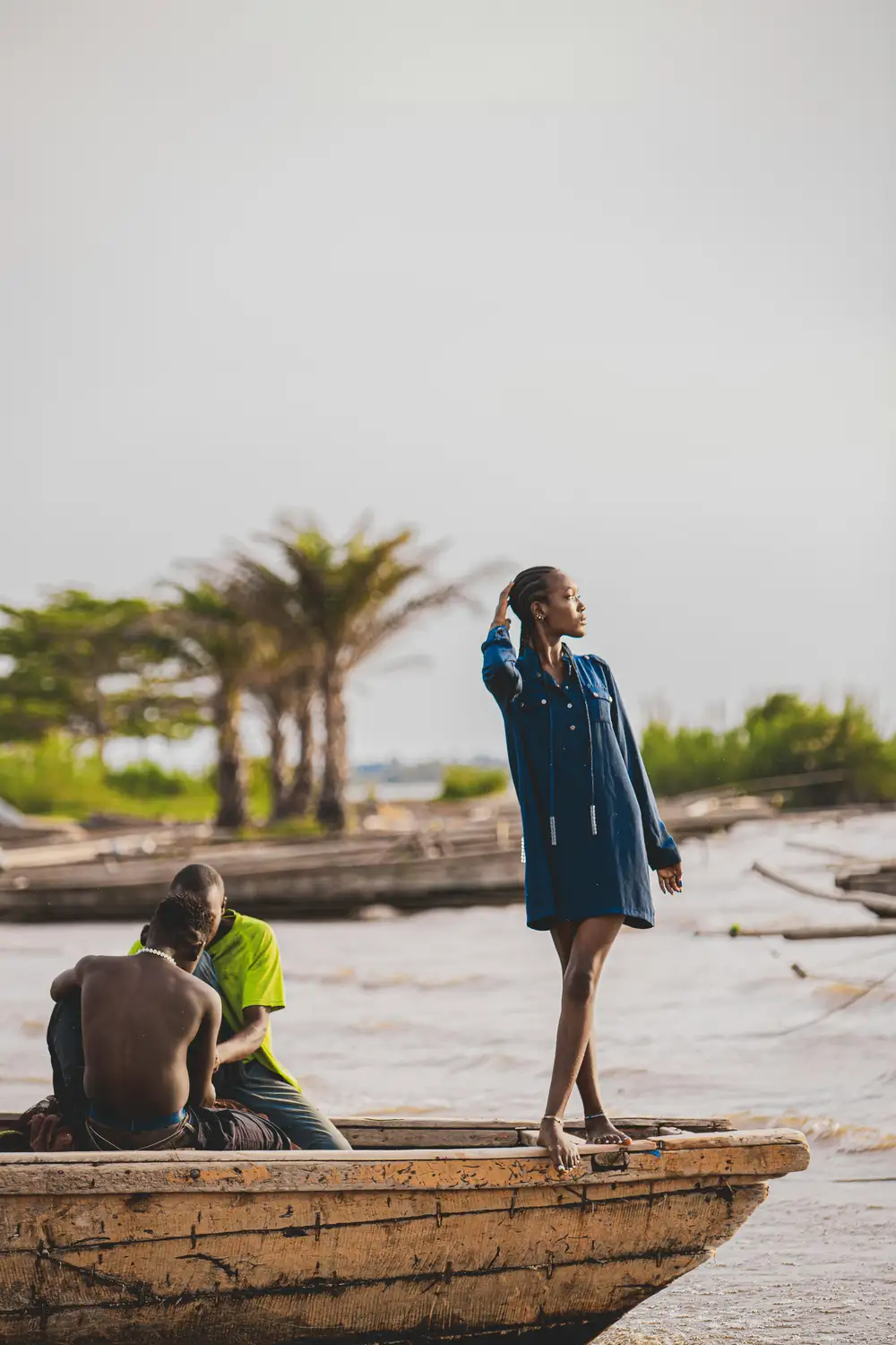 lady posing by the water