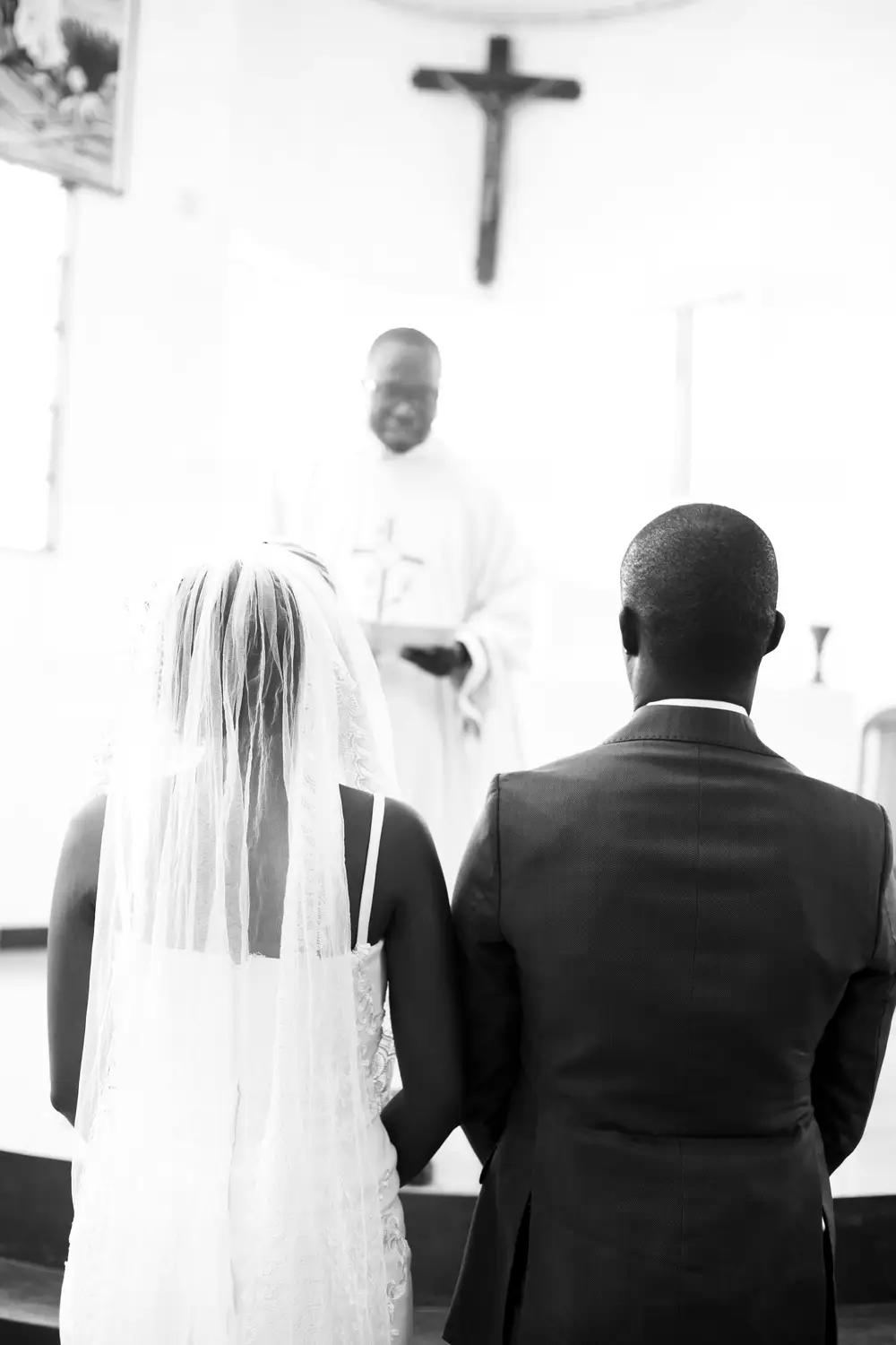couples at the alter for blessings