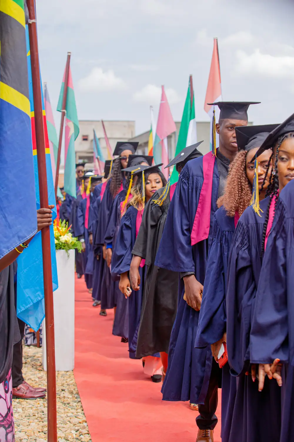 students on graduation gowns